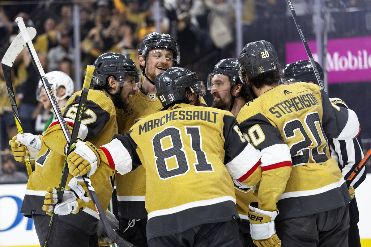 The Golden Knights celebrate after Golden Knights right wing Mark Stone (61) scored during the ...