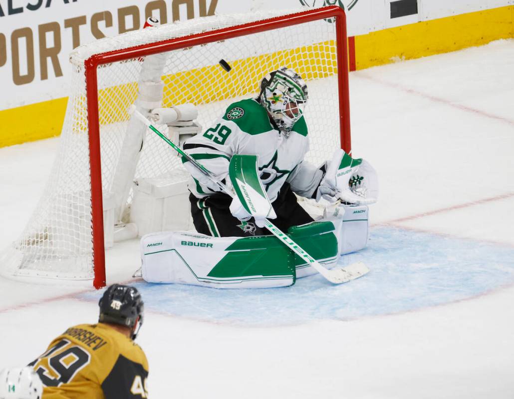 Dallas Stars goaltender Jake Oettinger (29) cannot stop a shot by Golden Knights right wing Jon ...