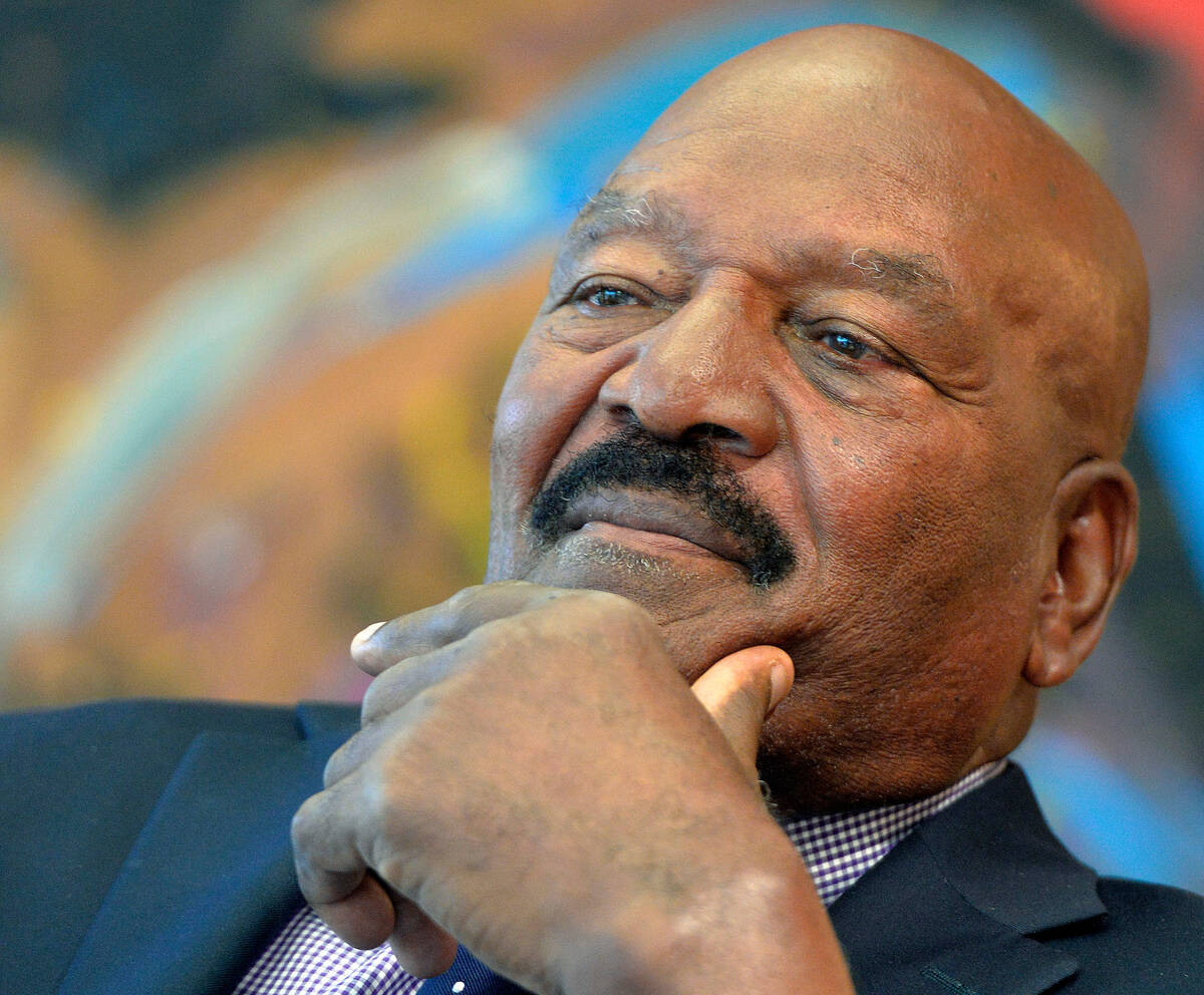 FILE - In this Sept. 27, 2014, file photo, Pro Football Hall of Famer Jim Brown meets with othe ...