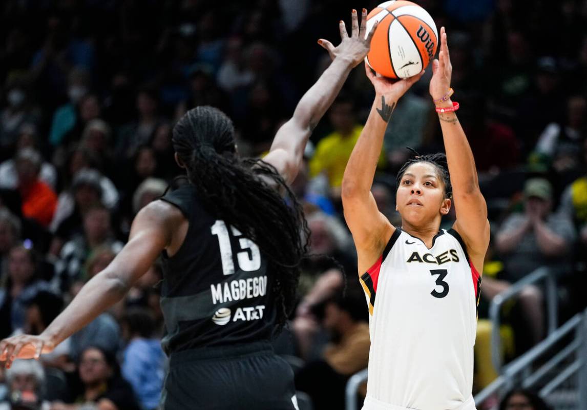 Las Vegas Aces forward Candace Parker (3) looks to shoot against Seattle Storm center Ezi Magbe ...