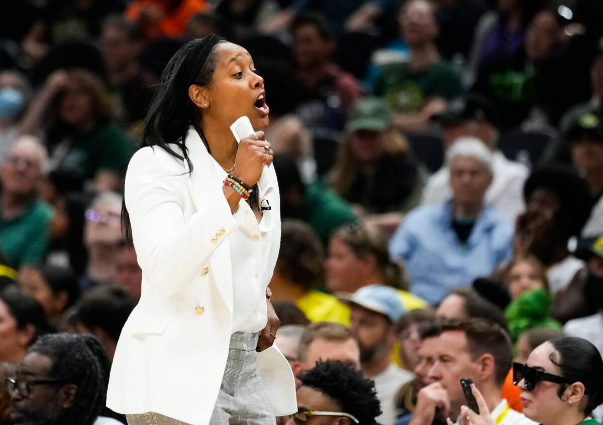 Seattle Storm head coach Noelle Quinn yells during the first half of a WNBA basketball game aga ...