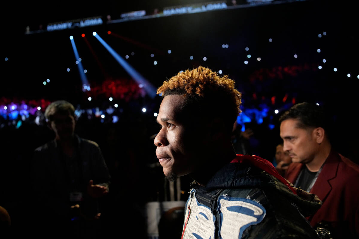 Devin Haney walks to the ring before his fight against Vasiliy Lomachenko in an undisputed ligh ...