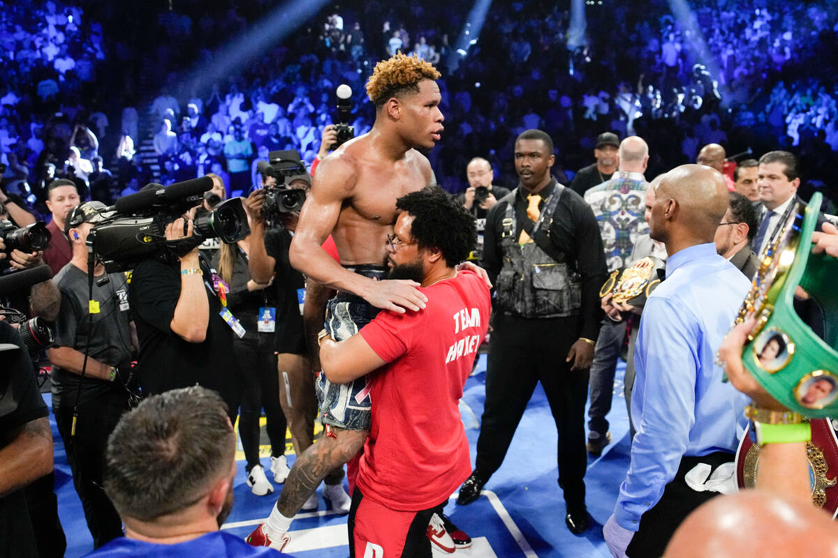 Devin Haney celebrates after defeating Vasiliy Lomachenko in an undisputed lightweight champion ...