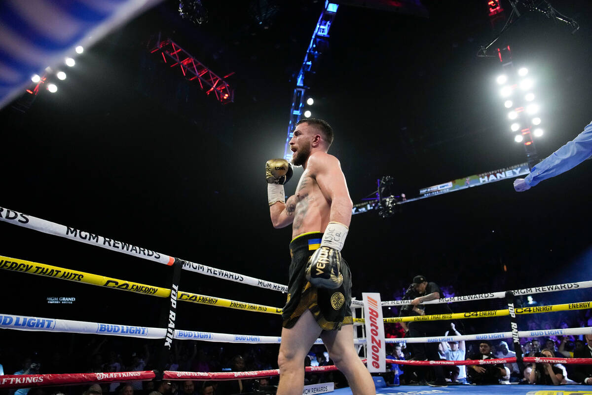 Vasiliy Lomachenko reacts during his fight against Devin Haney in an undisputed lightweight cha ...