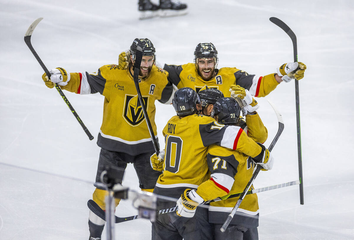 Golden Knights center William Karlsson (71) and teammates celebrate another goal against the Da ...