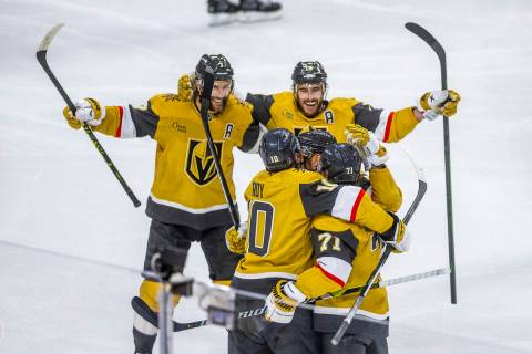 Golden Knights center William Karlsson (71) and teammates celebrate another goal against the Da ...