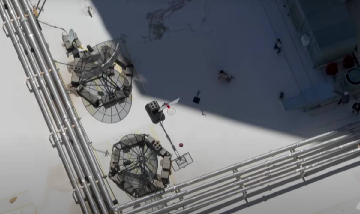 A screenshot world's highest basketball shot off the 108th-level SkyJump platform. The Dude Per ...