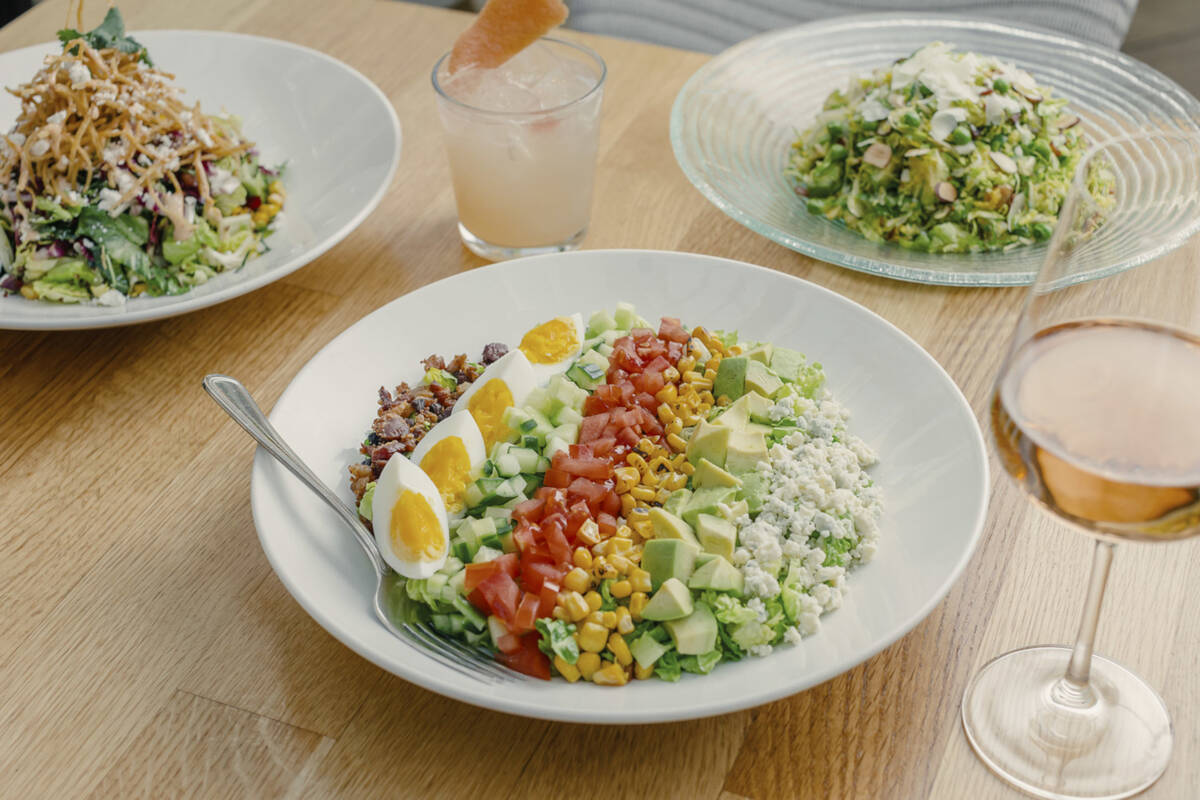 A Wilshire Boulevard Cobb salad, front, from Summer House, a California cuisine- and beach hous ...