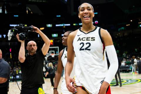 Las Vegas Aces forward A'ja Wilson (22) smiles while walking off the court after winning Game 3 ...