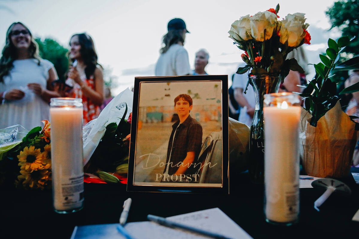 A framed photo of Donavyn Propst is seen at a vigil for the 17-year-old Faith Lutheran senior o ...