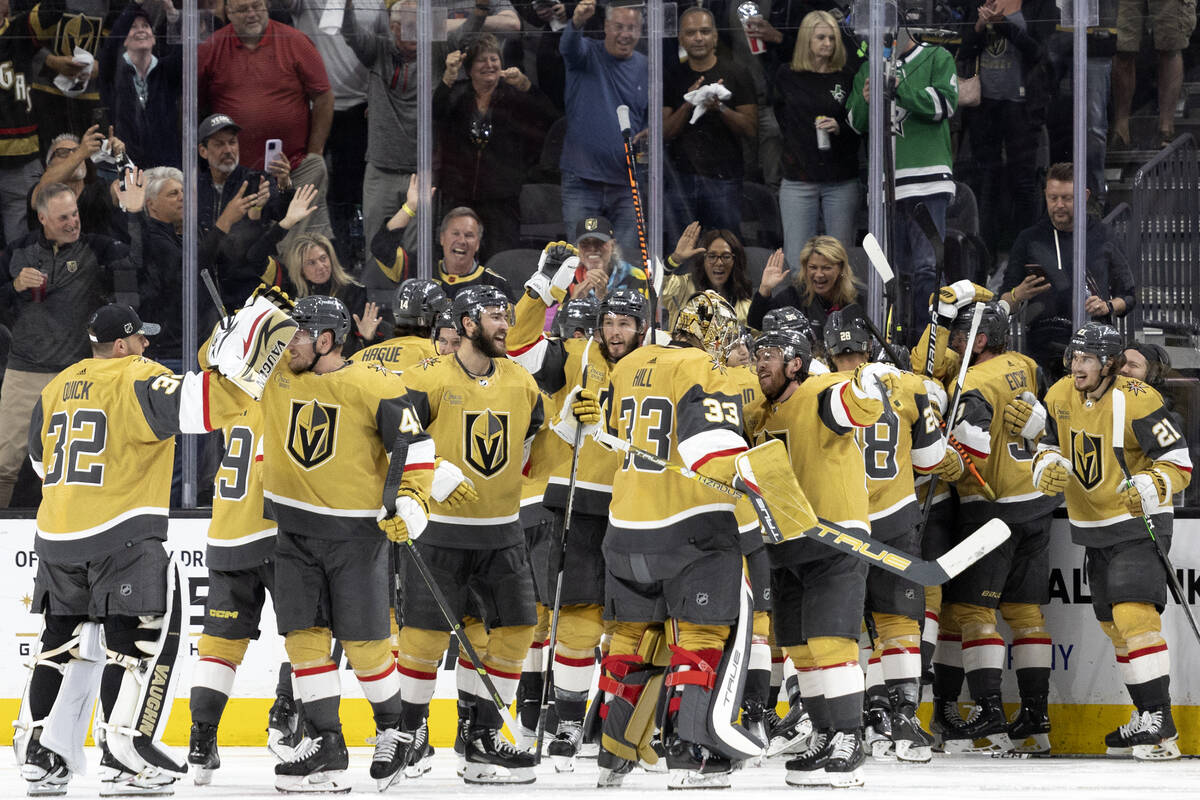 The Golden Knights celebrate their during overtime win in Game 2 of the NHL hockey Stanley Cup ...