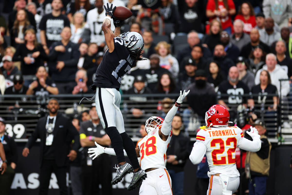 Las Vegas Raiders wide receiver Davante Adams (17) misses the ball for an incomplete pass in th ...