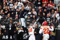 Las Vegas Raiders wide receiver Davante Adams (17) misses the ball for an incomplete pass in th ...