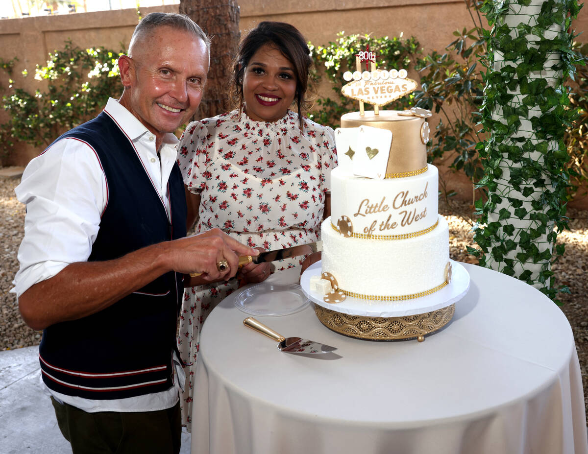 Owner Greg Smith and his wife Yvette Smith cut the cake on the 80th birthday of Little Church o ...
