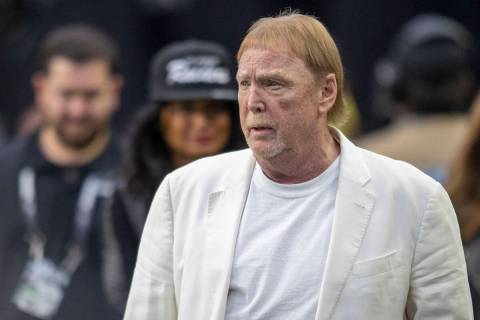Raiders owner Mark Davis takes the field before an NFL game against the San Francisco 49ers at ...