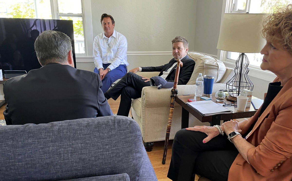 Jeremy Renner, center right, meets with lobbyists and former Nevada Gov. Brian Sandoval, center ...