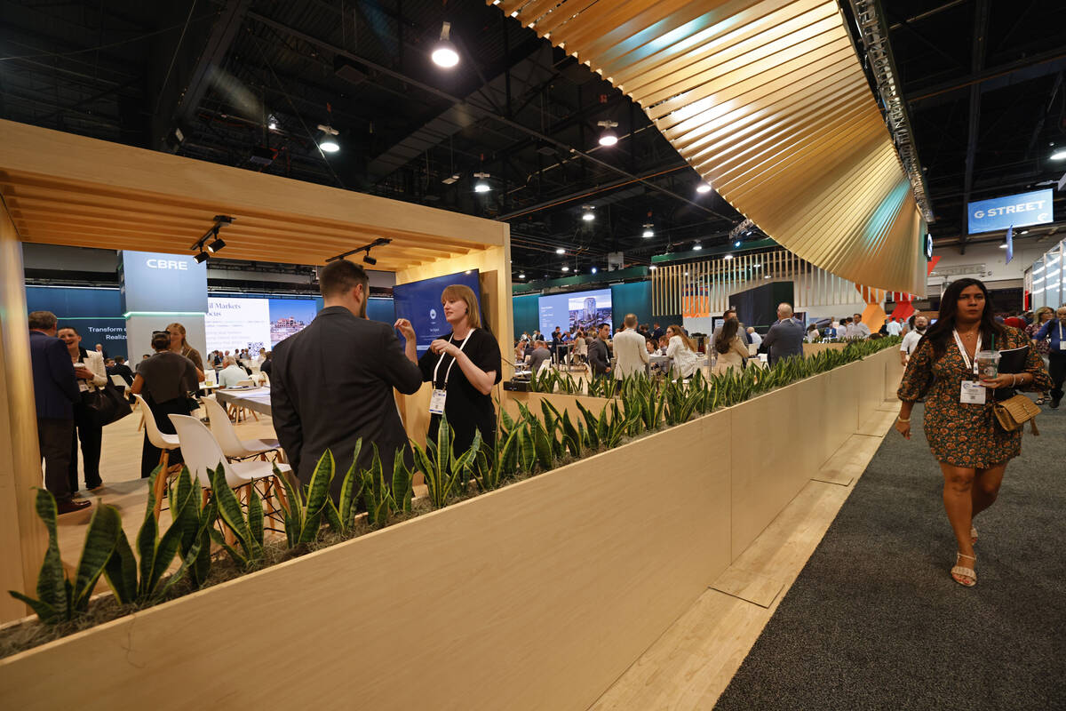 People attend ICSC Las Vegas at Las Vegas Convention Center, Tuesday, May 23, 2023. (Chitose Su ...