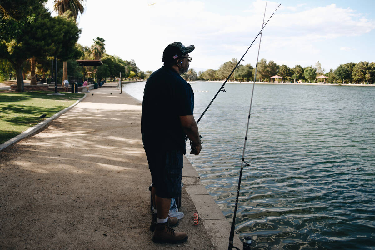 Larry Mitchell fishes at Sunset Park Pond on Tuesday, May 23, 2023, at Sunset Park in Las Vegas ...