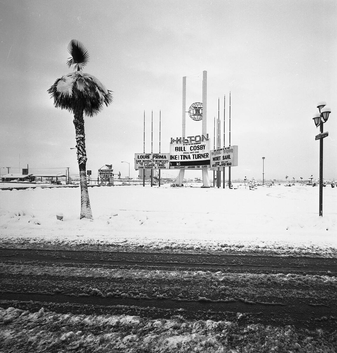 The marquee at the Las Vegas Hilton after a snowstorm touts Bill Cosby, Ike & Tina Turner, Loui ...