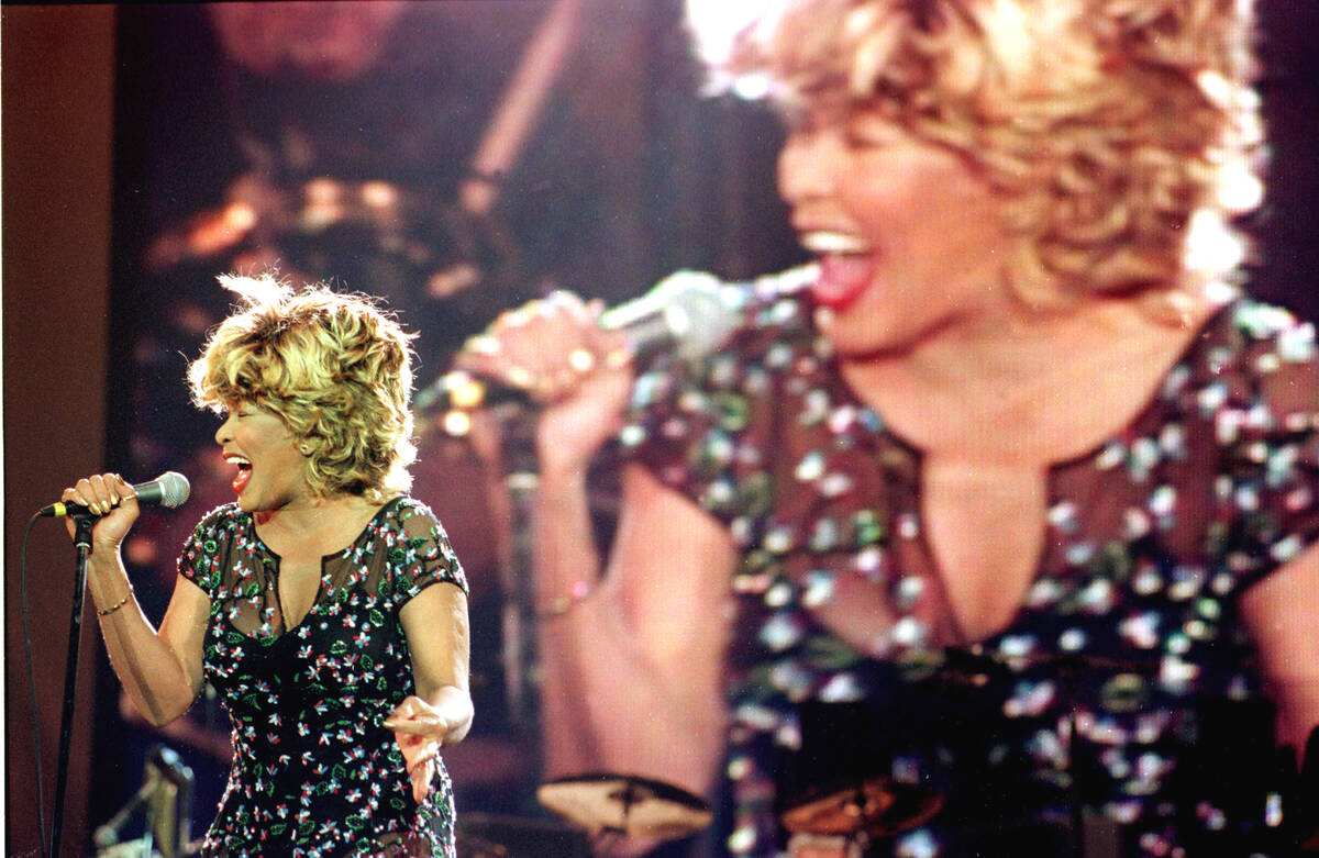 Singer Tina Turner, backed by a giant screen, electrifies fans in a highly charged concert pres ...