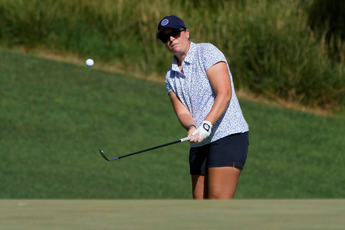 Lauren Coughlin chips onto the second green during the first day of round-robin play in the LPG ...