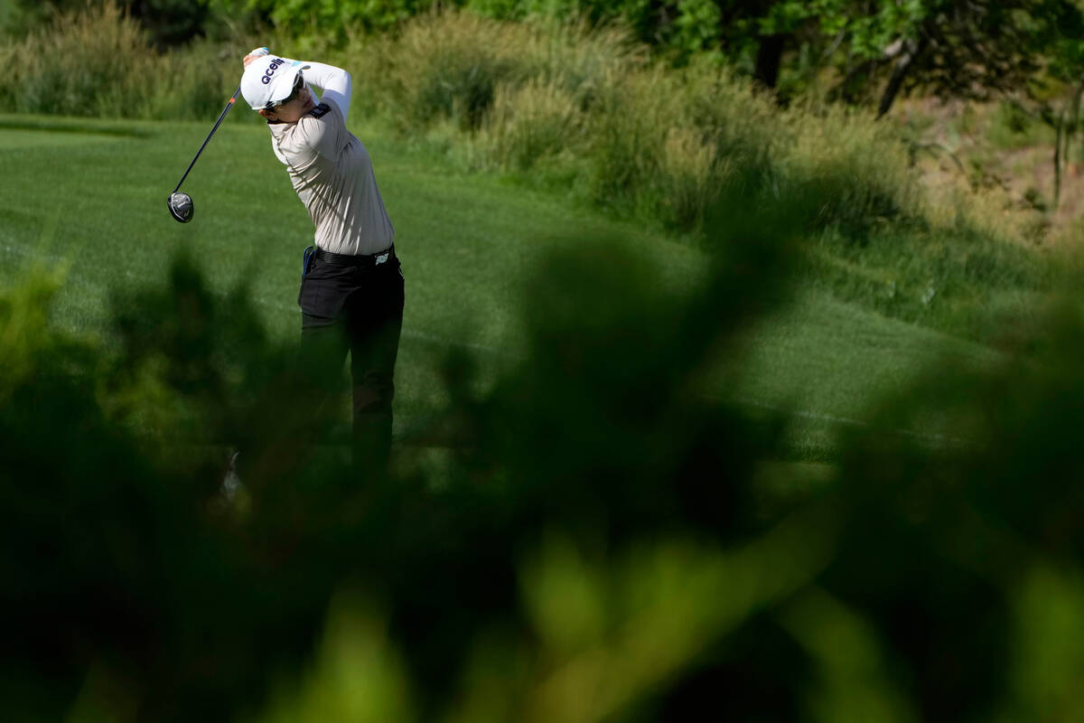 Eun-Hee Ji hits off the first tee during the first day of round-robin play in the LPGA Bank of ...