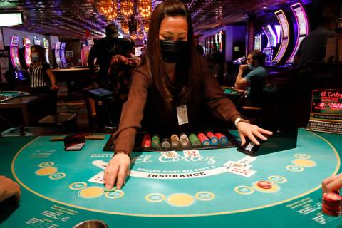 Blackjack Dealer Leu Pham works at El Cortez in Las Vegas in September 2021. (Chitose Suzuki / ...