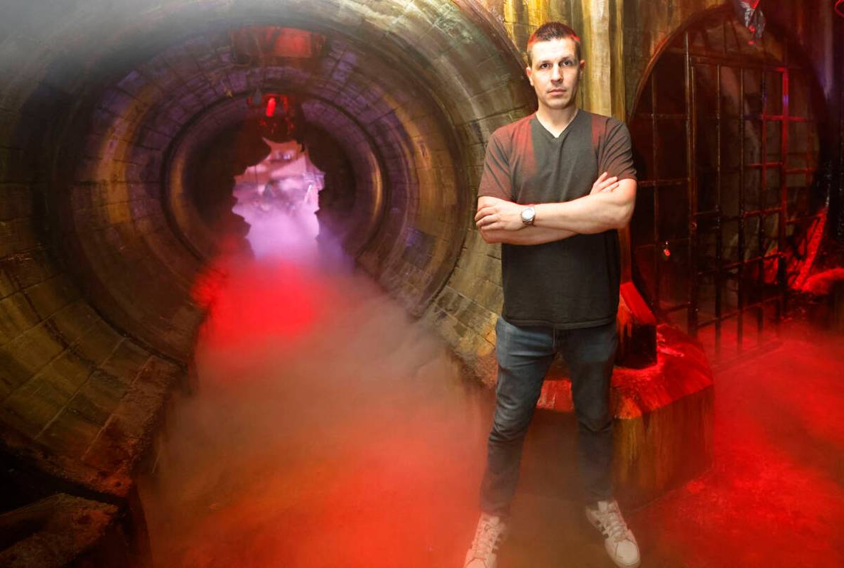 Escape IT Owner/Creator Jason Egan poses for a photo on the set of a sewer tunnel at Escape IT, ...