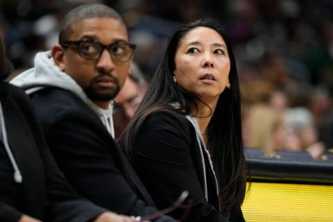 Las Vegas Aces first assistant coach Natalie Nakase, right, and interim head coach Tyler Marsh, ...