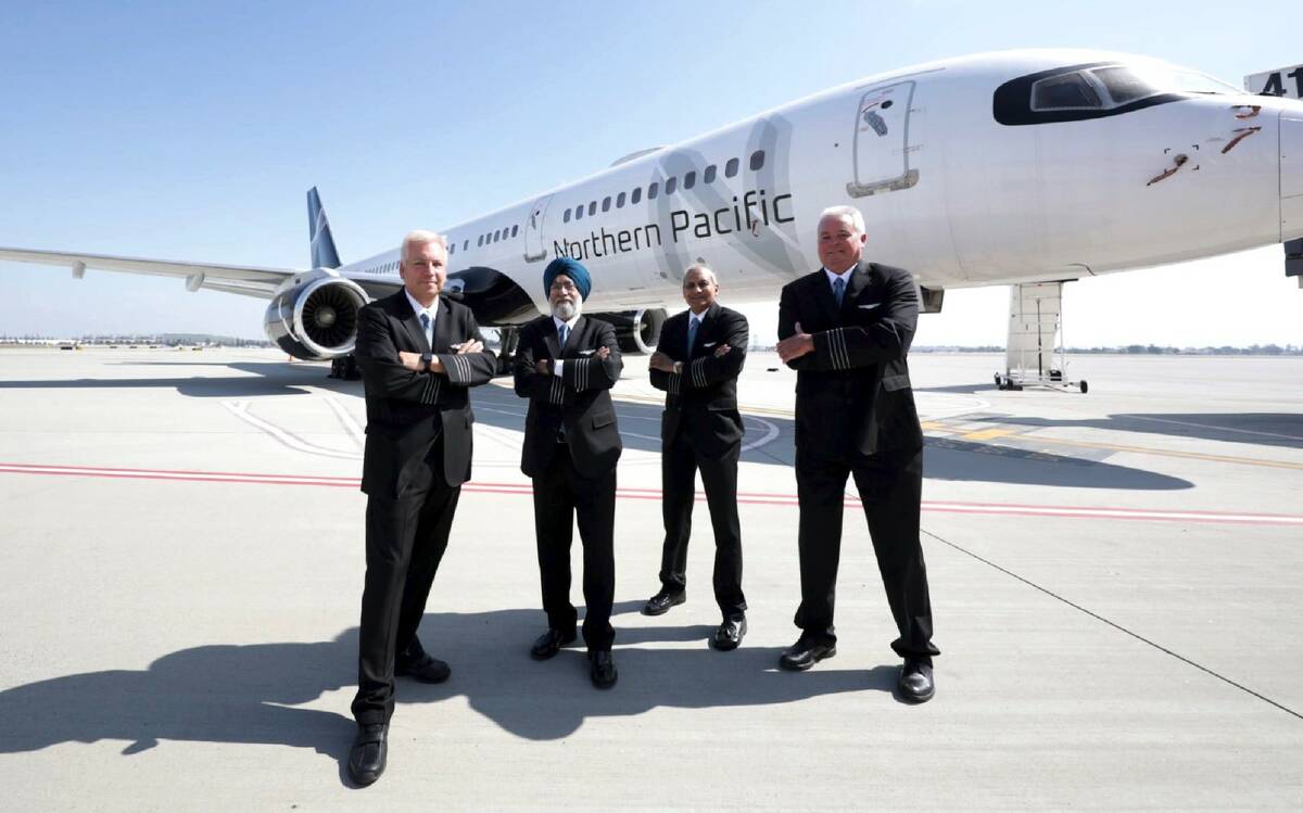 Chief Pilot Jon Heyl and Northern Pacific Airways pilots Kanwaljit Cheema,Tilak Ramaprakash and ...