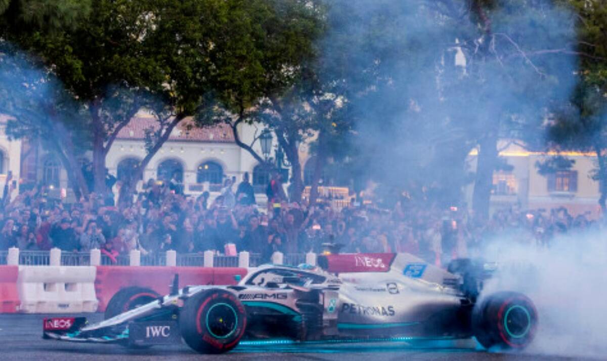 George Russell turns doughnuts across from the Bellagio while racing down the Strip during the ...
