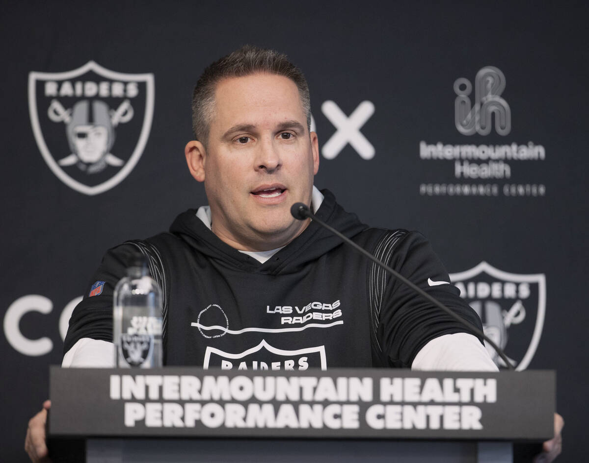 Raiders head coach Josh McDaniels responds to questions during a news conference at the Intermo ...