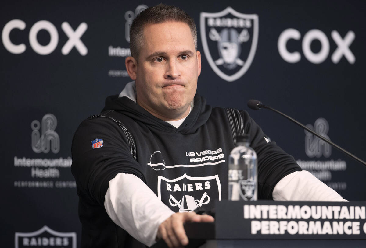 Raiders head coach Josh McDaniels takes media questions during a news conference at the Intermo ...