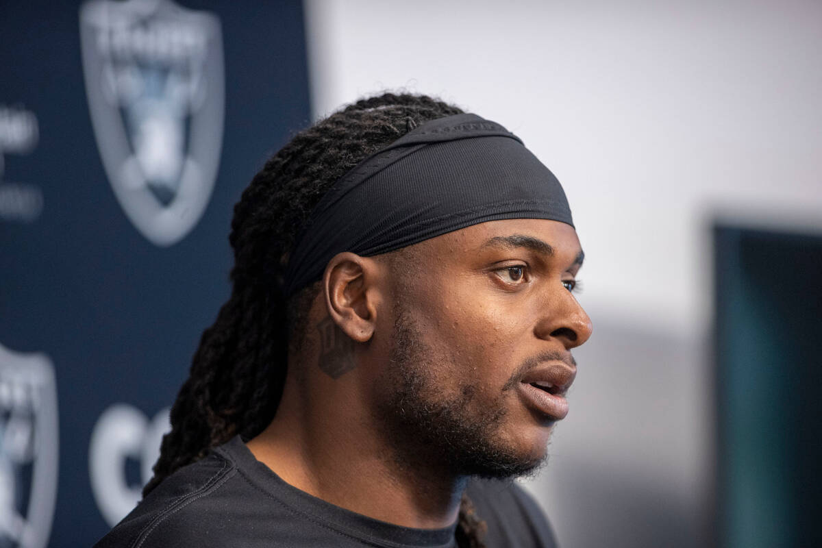 Raiders wide receiver Davante Adams answers a question during a news conference at the Intermou ...
