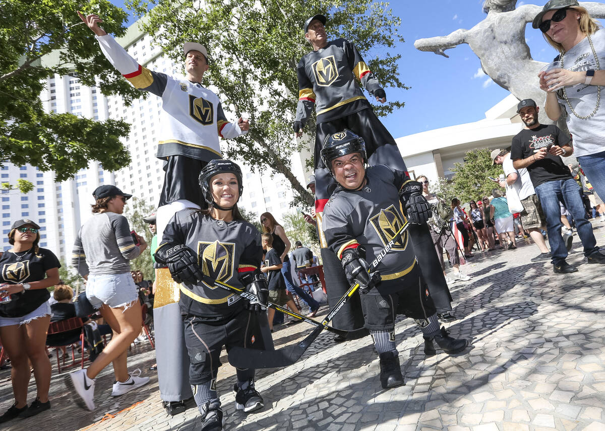 Vegas Golden Knights performers pose for photos before Game 1 of the NHL hockey Stanley Cup Fin ...