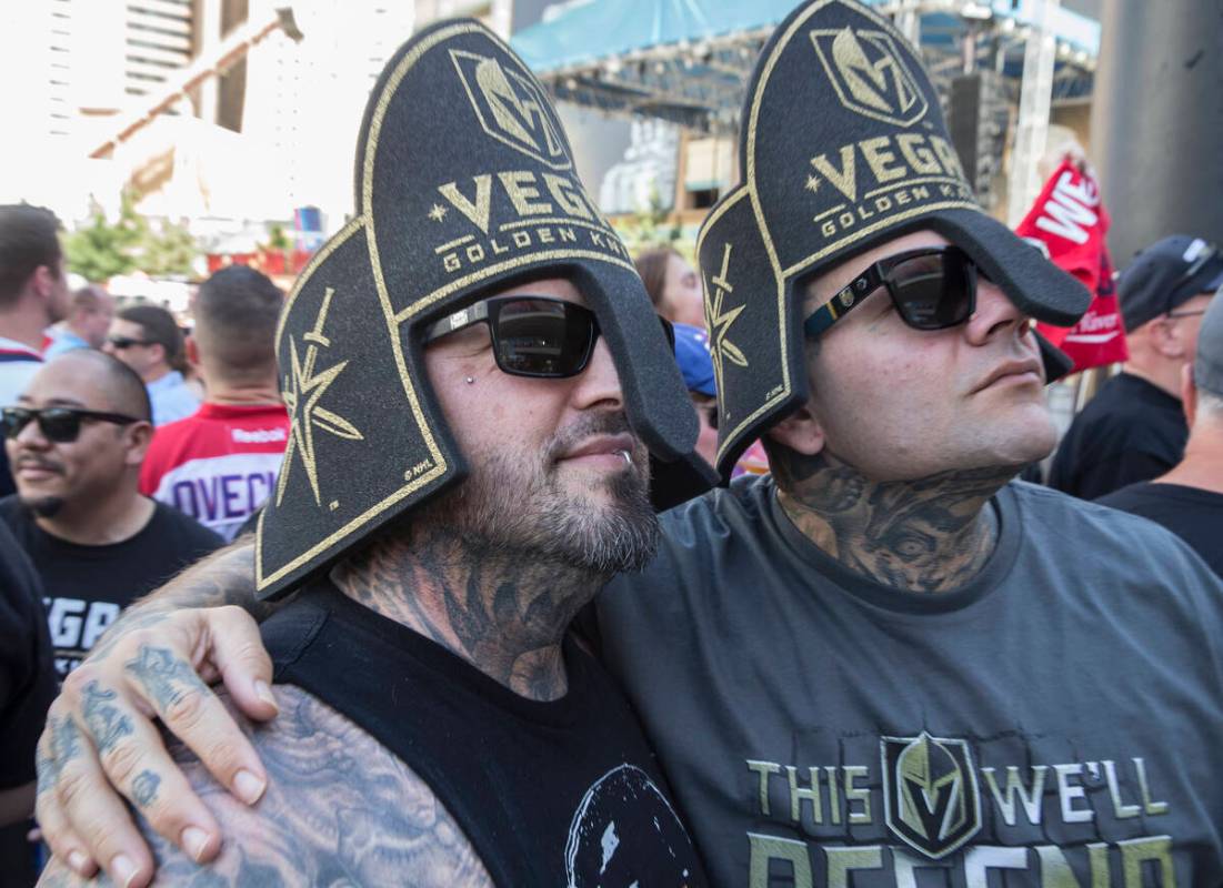 Golden Knights fans Jason Ozbat, left, and Carl Grace outside T-Mobile Arena before the start o ...