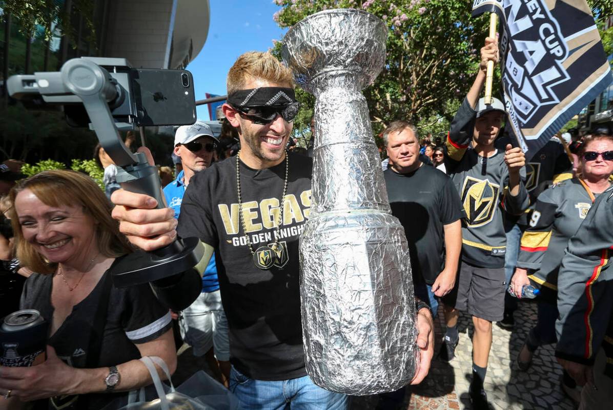 Vegas Golden Knights fan Brandon Laubhan holds a make shift Stanley Cup before Game 1 of the NH ...