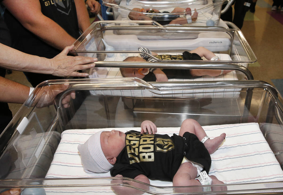 Newborn babies, including Jorge Guitar, front, Boadie Morgan, center, and Leila Rose are seen w ...