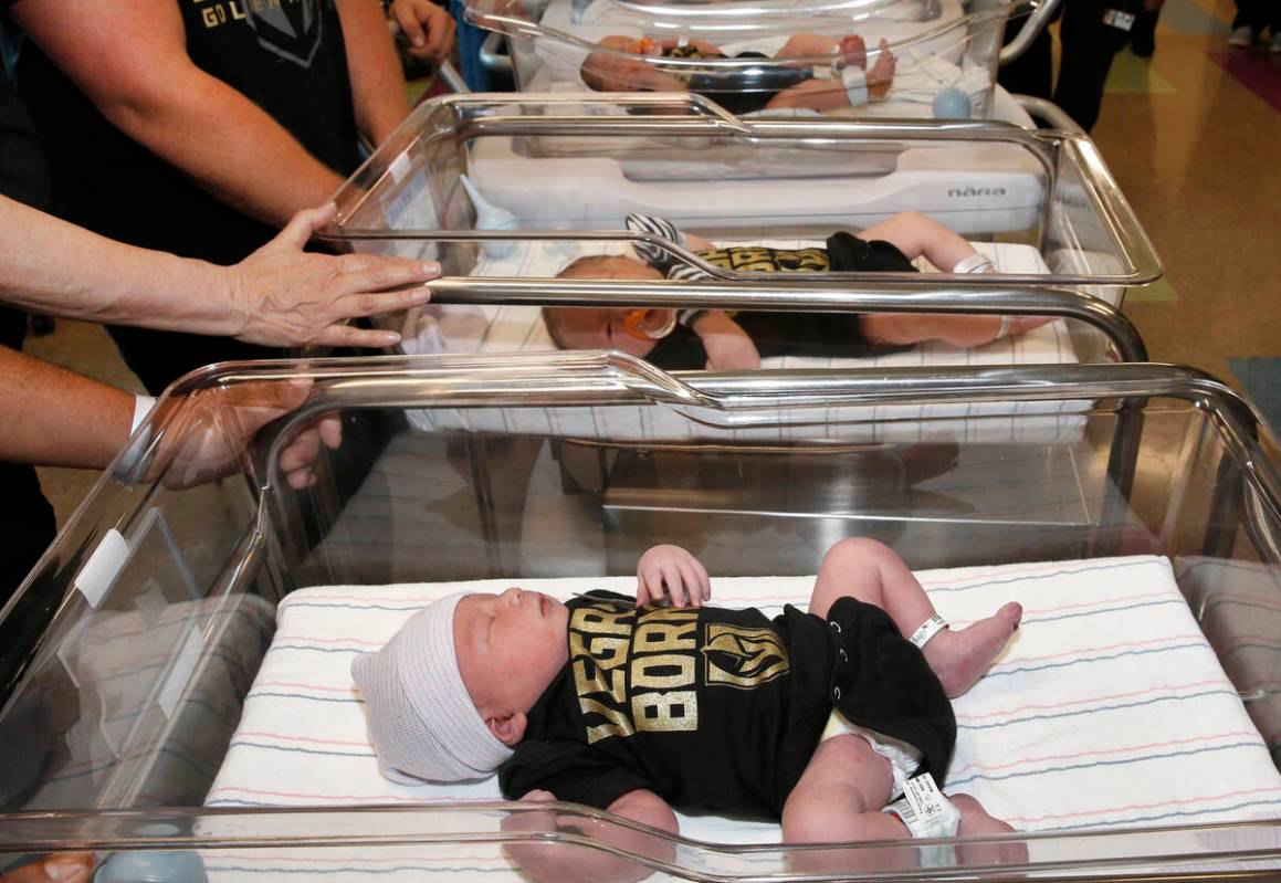 Newborn babies, including Jorge Guitar, front, Boadie Morgan, center, and Leila Rose are seen w ...