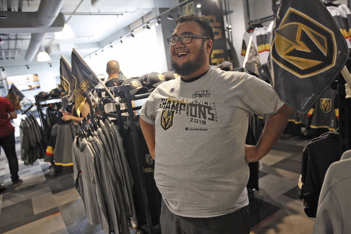 Faustino Solis tries on his Golden Knights western conference championship shirt at the Arsenal ...