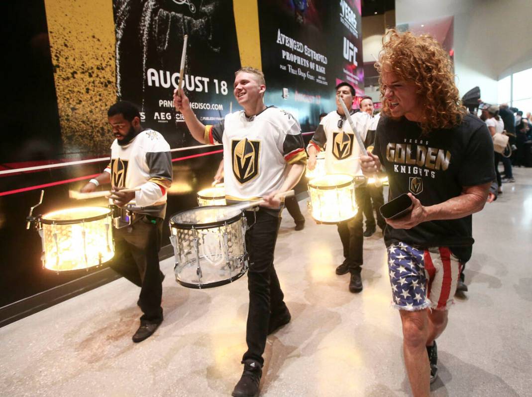 Carrot Top, right, joins the Knight Line during a pregame parade ahead of Game 1 of the NHL hoc ...