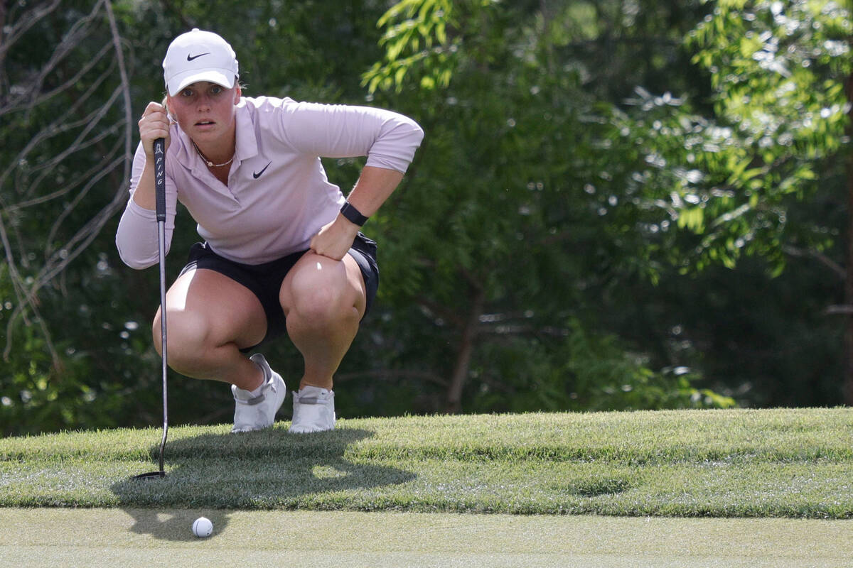 Maja Stark of Sweden lines up a putt on the 13th green during the second day of round-robin pla ...