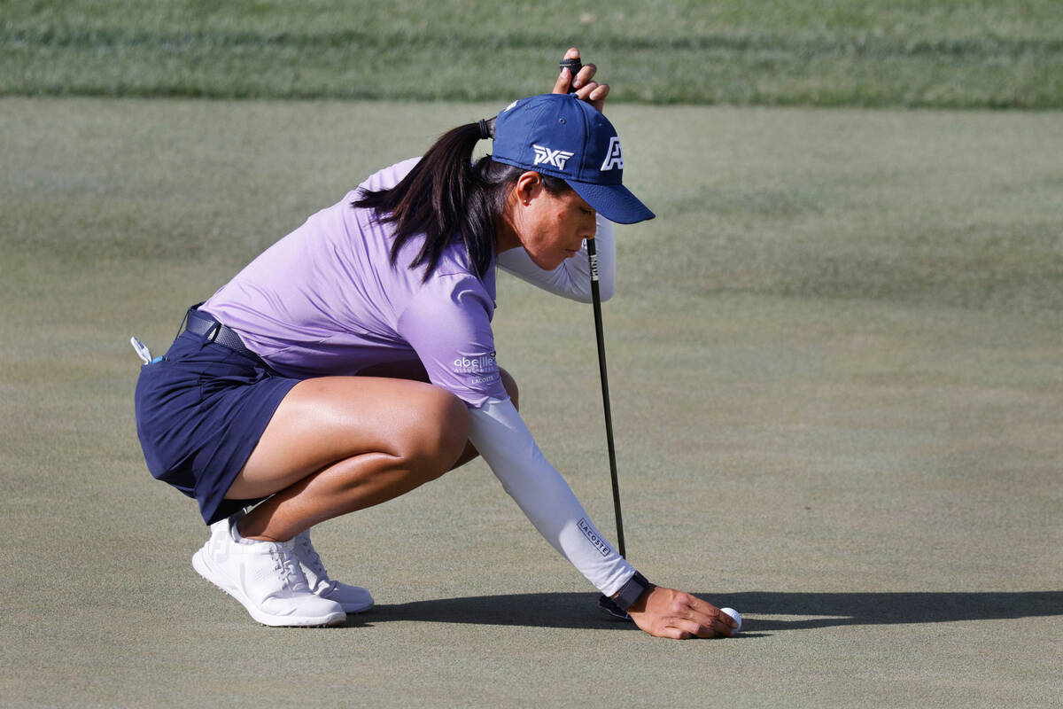 Celine Boutier of France lines up a putt on the 12th green during the second day of round-robin ...