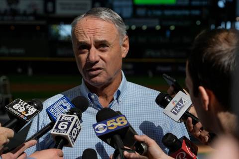 Major League Baseball Commissioner Rob Manfred answers quesions before a baseball game between ...