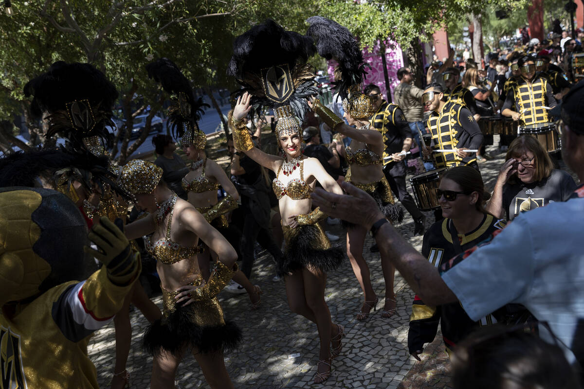 The Golden Knights parade travels through fans toward T-Mobile Arena before Game 5 of the NHL h ...