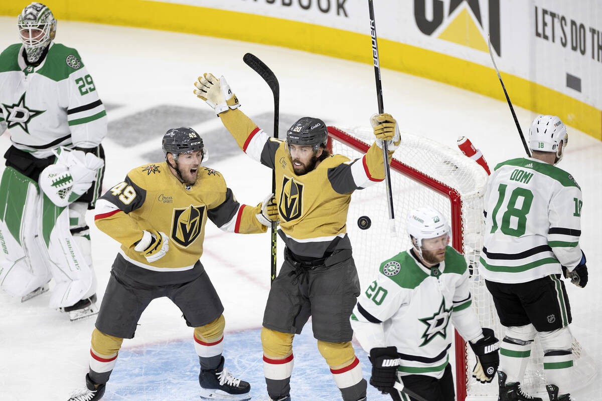 Golden Knights center Ivan Barbashev (49) and center Chandler Stephenson (20) celebrate after S ...