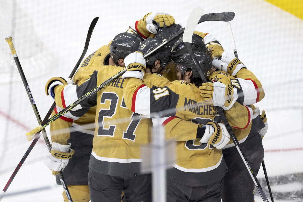 The Golden Knights celebrate after center Chandler Stephenson (20) scored during the second per ...