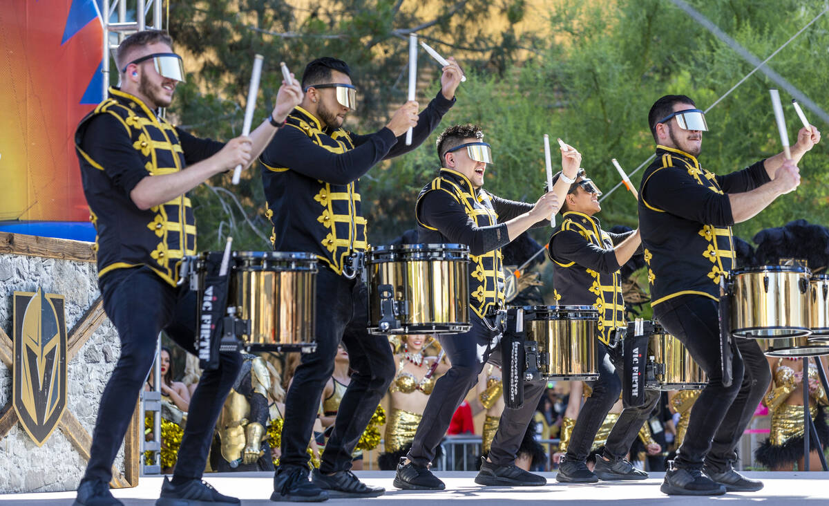 The Golden Knights Knight Line Drumbots perform for the fans outside before the first period of ...