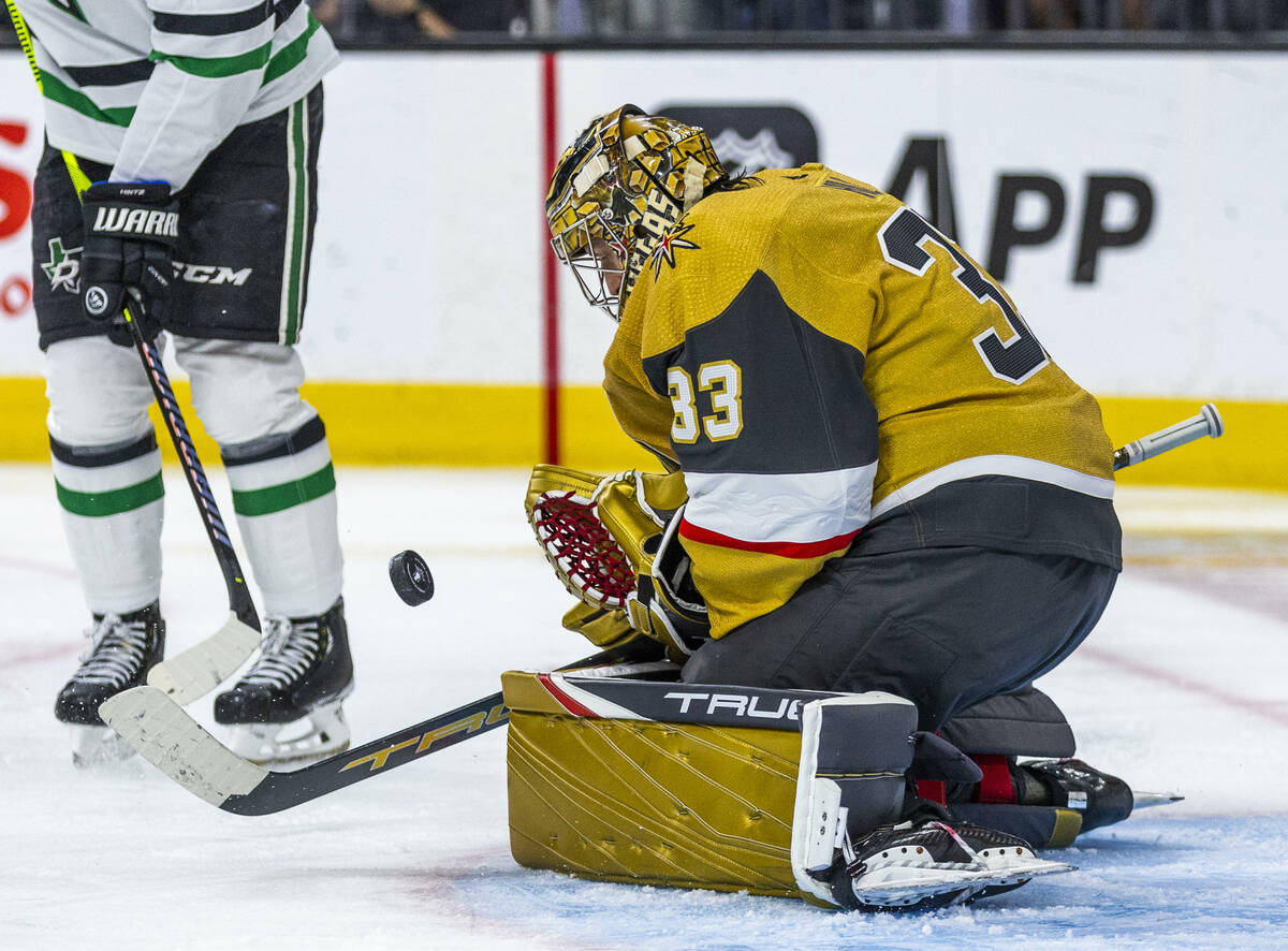 Golden Knights goaltender Adin Hill (33) looks in another shot on goal by the Dallas Stars in t ...