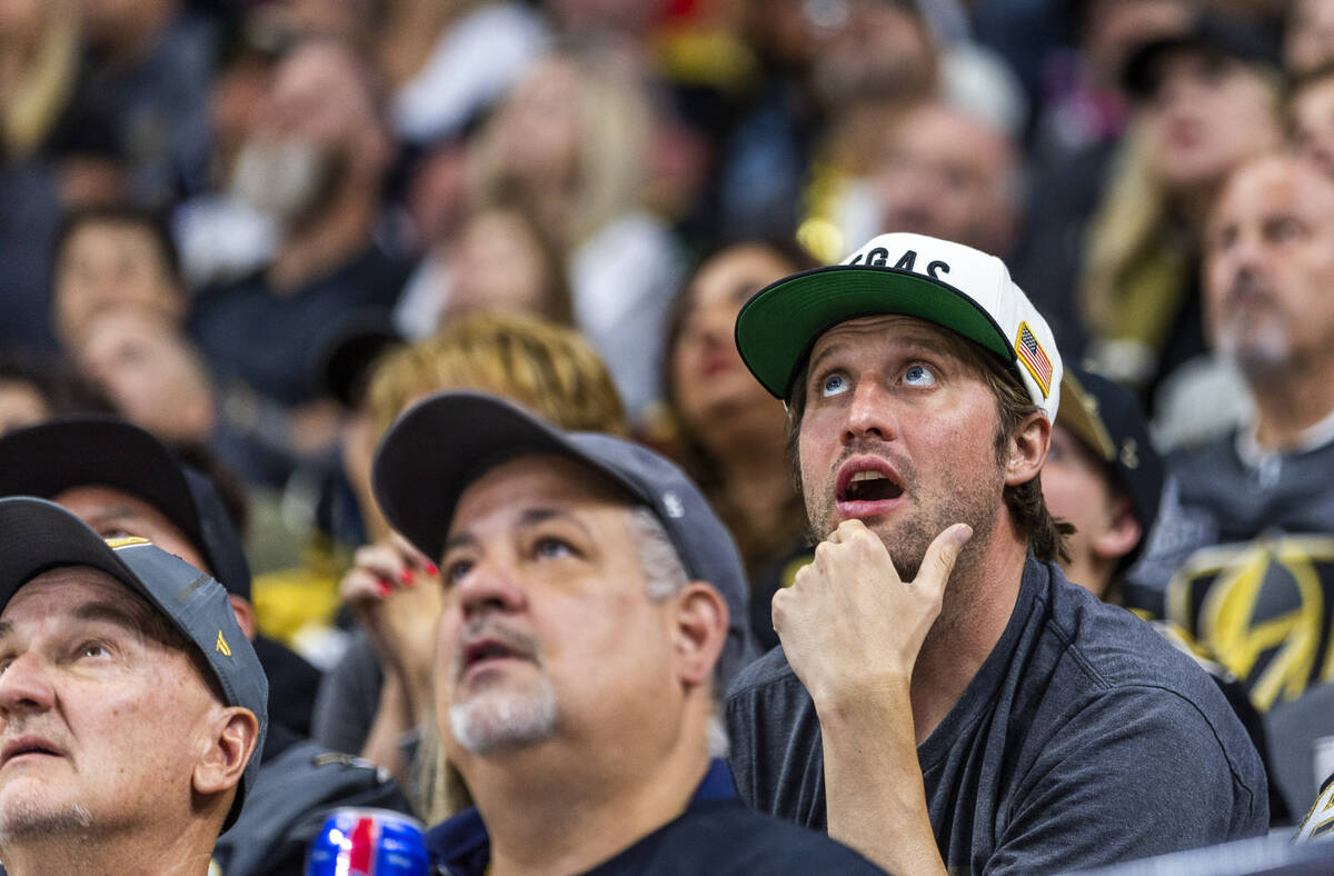 Golden Knights fans react to a fourth goal by the Dallas Stars in the third period of Game 5 du ...